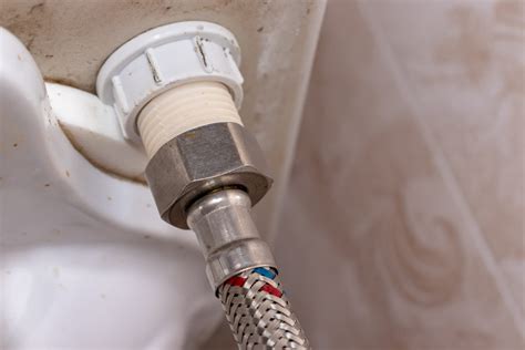 toilet tank hose leaking|Why Is My Toilet Water Line Leaking 